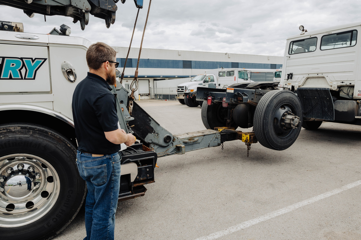 Heavy-duty Tow Pro tow truck attaching a semi-truck to be towed.